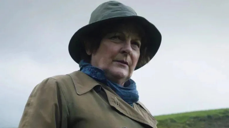 Brenda Blethyn's Vera Stanhope wearing a hat and looking stern on Vera