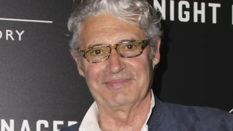 Michael Nouri smiling at the camera