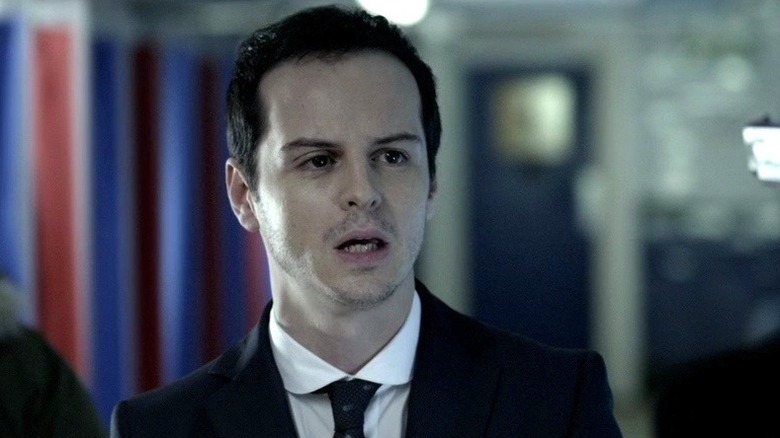 Andrew Scott as Moriarty looking bored in Sherlock
